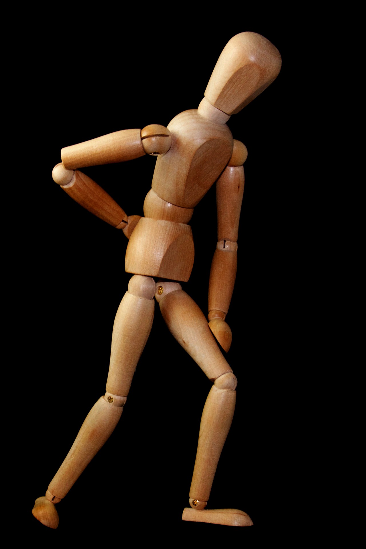 wooden man back pain Topic Tree of Life Centre Cheltenham